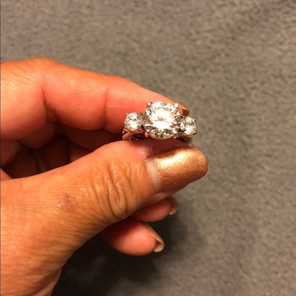 CZ 3 stone ring mounted on silver tone setting. - Picture 2 of 8